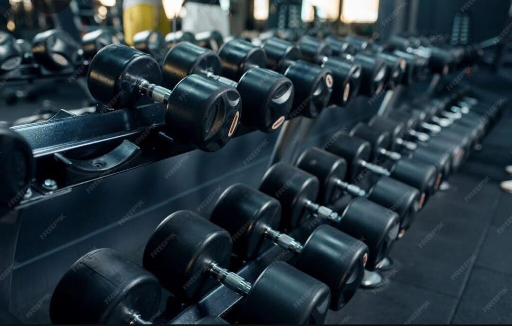 “Gym gallery images showing workout sessions and modern equipment at IMBACK Fitness Arena Kollam”